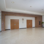  Caption: Holy Ghost Catholic Church Parish Life Center / Holy Ghost Catholic ChurchAbell Crozier Davis Architects Silver Winner / Credits: Ray Urdaz (interior photos, cross closeup, and existing school cross stone wall), all other photos, courtesy of James Peck / The Pixel House
