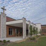  Caption: Holy Ghost Catholic Church Parish Life Center / Holy Ghost Catholic ChurchAbell Crozier Davis Architects Silver Winner / Credits: Ray Urdaz (interior photos, cross closeup, and existing school cross stone wall), all other photos, courtesy of James Peck / The Pixel House