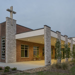  Caption: Holy Ghost Catholic Church Parish Life Center / Holy Ghost Catholic ChurchAbell Crozier Davis Architects Silver Winner / Credits: Ray Urdaz (interior photos, cross closeup, and existing school cross stone wall), all other photos, courtesy of James Peck / The Pixel House